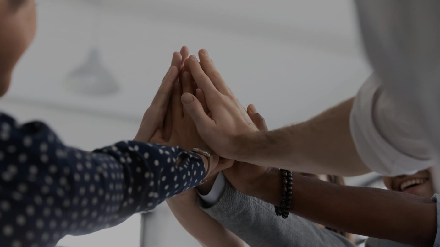 Team giving a high five.